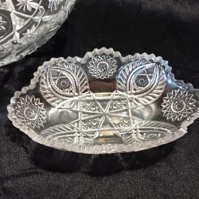 Three beautiful glass dishes Large bowl, oval scalloped dish, and small plate