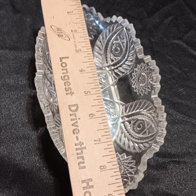 Three beautiful glass dishes Large bowl, oval scalloped dish, and small plate