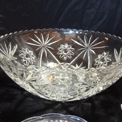Three beautiful glass dishes Large bowl, oval scalloped dish, and small plate