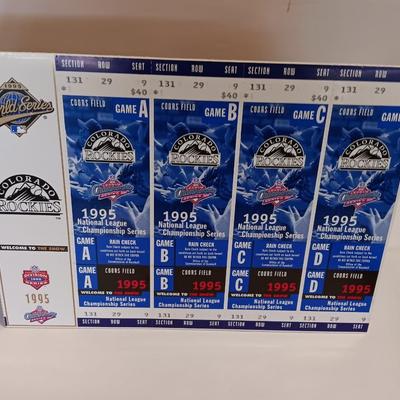 Colorado Rockies 25th anniversary book, Field played ball, and world series tickets