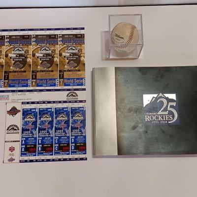 Colorado Rockies 25th anniversary book, Field played ball, and world series tickets