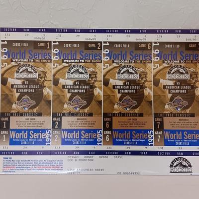 Colorado Rockies 25th anniversary book, Field played ball, and world series tickets