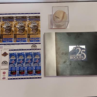 Colorado Rockies 25th anniversary book, Field played ball, and world series tickets