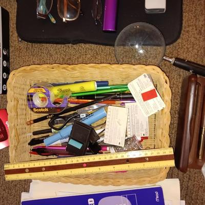 Assortment of office and school supplies including v tec cordless phones, personal fan and more