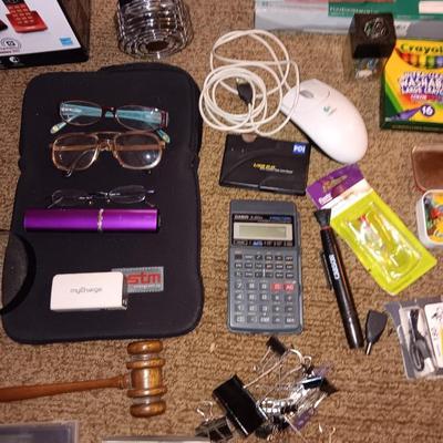 Assortment of office and school supplies including v tec cordless phones, personal fan and more