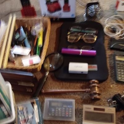 Assortment of office and school supplies including v tec cordless phones, personal fan and more