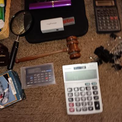 Assortment of office and school supplies including v tec cordless phones, personal fan and more