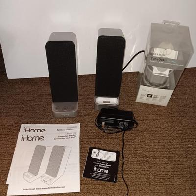 I home speaker charging system and a ipod tunedok