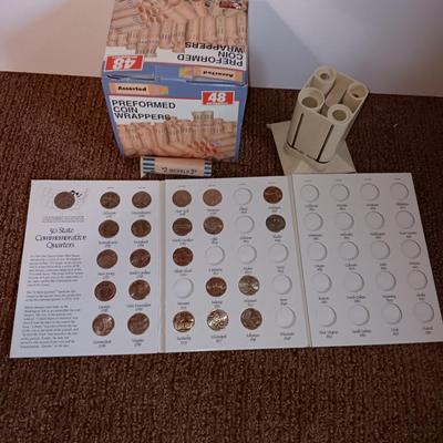 Preformed coin wrappers and a collection of United States quarters with map