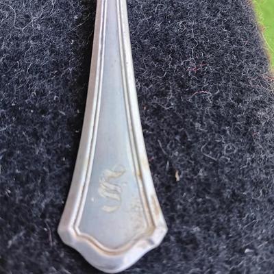 Sterling silver marked clam shaped spoon