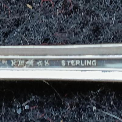 Sterling silver marked clam shaped spoon
