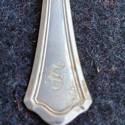 Sterling silver marked clam shaped spoon