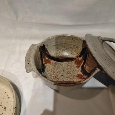 Kitchen pottery pieces, lidded pot, pie plate, and mugs