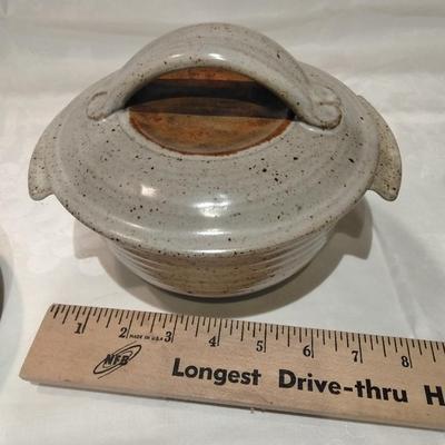 Kitchen pottery pieces, lidded pot, pie plate, and mugs