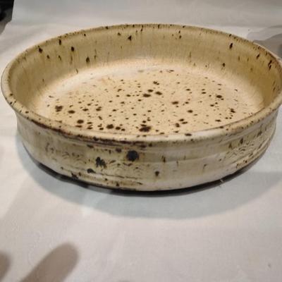 Kitchen pottery pieces, lidded pot, pie plate, and mugs