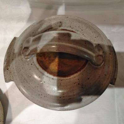 Kitchen pottery pieces, lidded pot, pie plate, and mugs