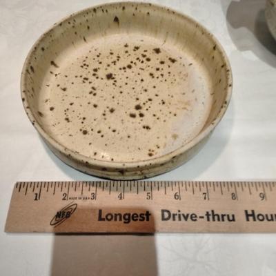 Kitchen pottery pieces, lidded pot, pie plate, and mugs