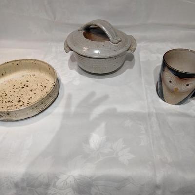 Kitchen pottery pieces, lidded pot, pie plate, and mugs