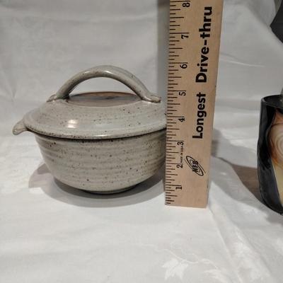 Kitchen pottery pieces, lidded pot, pie plate, and mugs