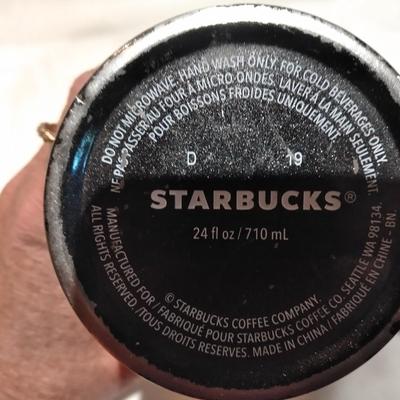 Three Starbucks mugs