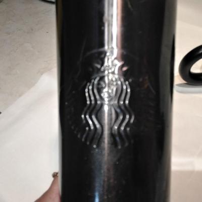Three Starbucks mugs