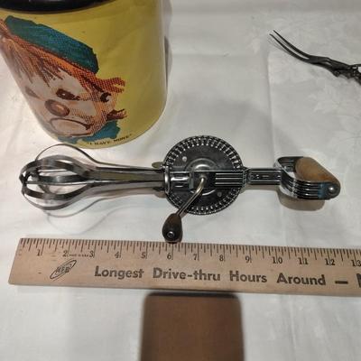 Vintage Ransburg Canister Cookie Metal Tin with vintage Kitchen Utensils