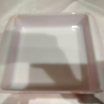 Two Pyrex baking dishes Town & Country with lid and pink brownie dish