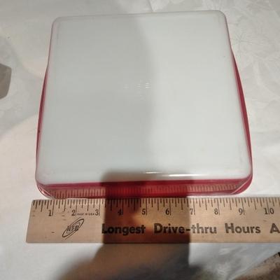 Two Pyrex baking dishes Town & Country with lid and pink brownie dish