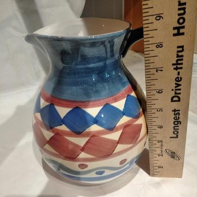 Ceramic water pitcher with clay dish