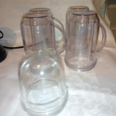 Small Magic Bullet mixer with accessories and Oyster storage cups