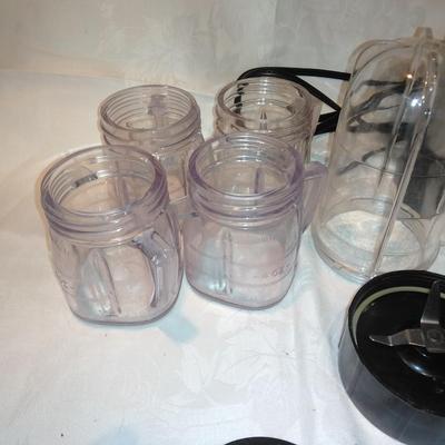 Small Magic Bullet mixer with accessories and Oyster storage cups