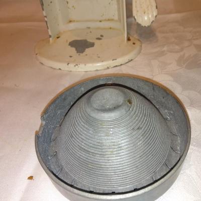 Antique Apple corer with vintage Juice o-mat juicer and stainless strainer