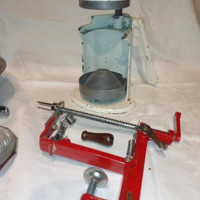 Antique Apple corer with vintage Juice o-mat juicer and stainless strainer