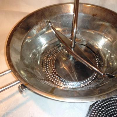 Antique Apple corer with vintage Juice o-mat juicer and stainless strainer