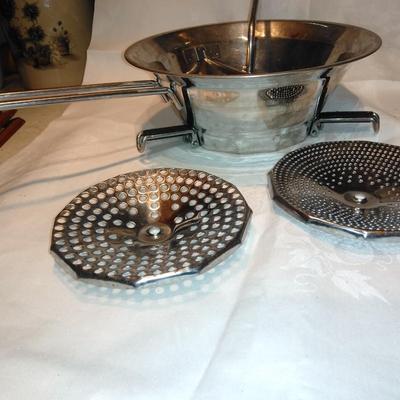 Antique Apple corer with vintage Juice o-mat juicer and stainless strainer