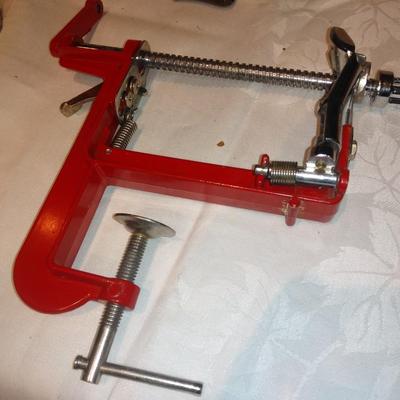 Antique Apple corer with vintage Juice o-mat juicer and stainless strainer