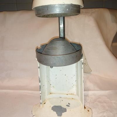 Antique Apple corer with vintage Juice o-mat juicer and stainless strainer