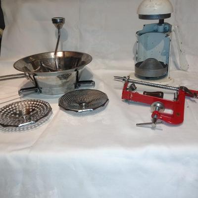Antique Apple corer with vintage Juice o-mat juicer and stainless strainer