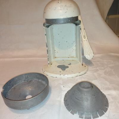 Antique Apple corer with vintage Juice o-mat juicer and stainless strainer