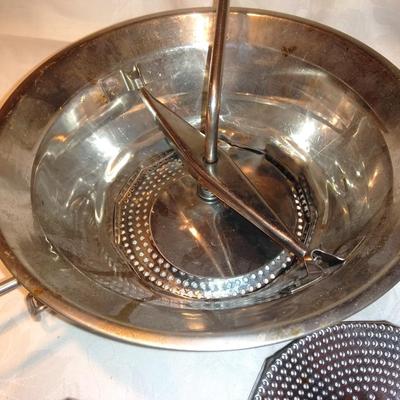 Antique Apple corer with vintage Juice o-mat juicer and stainless strainer