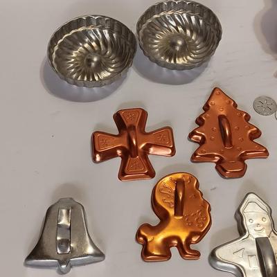 Vintage metal Cookie cutters and a vintage cookie press