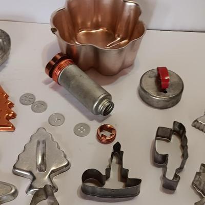 Vintage metal Cookie cutters and a vintage cookie press