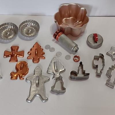 Vintage metal Cookie cutters and a vintage cookie press