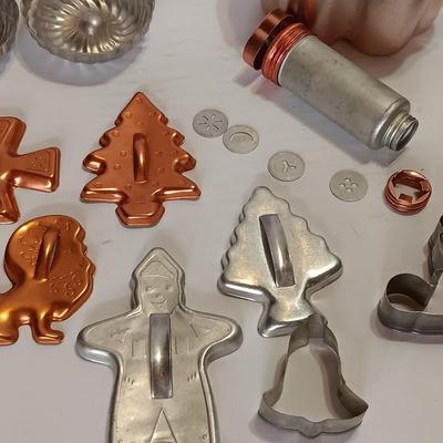 Vintage metal Cookie cutters and a vintage cookie press