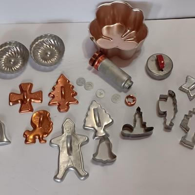 Vintage metal Cookie cutters and a vintage cookie press