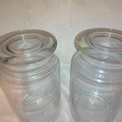 Collection of glass canisters and spice / pharmacy jars with lids