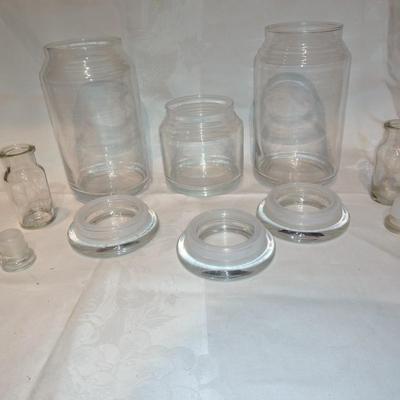 Collection of glass canisters and spice / pharmacy jars with lids