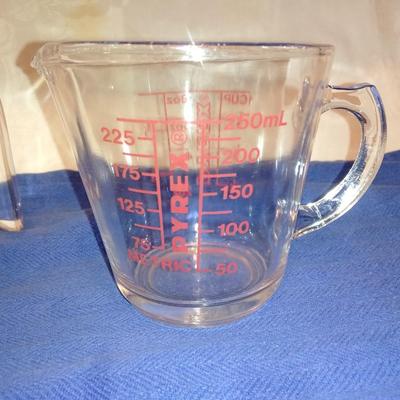 Two glass Pyrex measuring cups