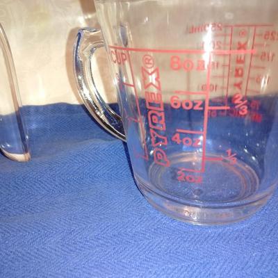 Two glass Pyrex measuring cups