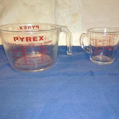 Two glass Pyrex measuring cups